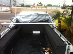 Custom upholstered truck bed storage build by Car Stereo Tony in Orange County