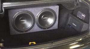 Dual subwoofer trunk installation with amplifier by Car Stereo Tony