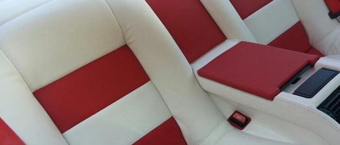 Custom Two-Tone Leather Interior Upgrade – Car Stereo Tony Custom red and white leather rear seat upholstery installation in Orange County