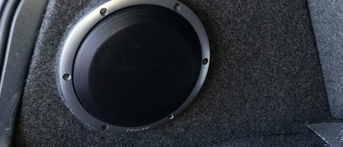 PHOTO-2026-02-24-09-59-31-4 Custom flush-mounted trunk subwoofer installation in Orange County