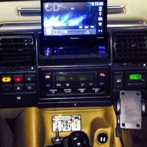 Pioneer flip-out touchscreen stereo installation in classic vehicle dashboard in Orange County