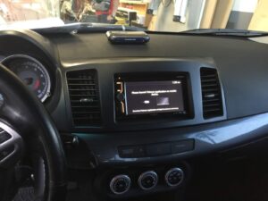 Professional radar detector and touchscreen stereo installation in Orange County