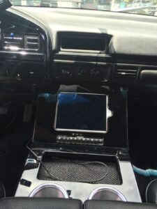 Custom touchscreen head unit installation and center console audio upgrade in Orange County