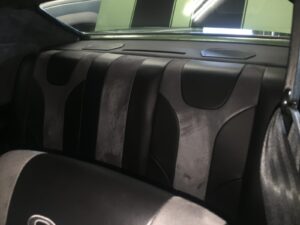 Custom rear interior upholstery and premium car audio installation in Orange County